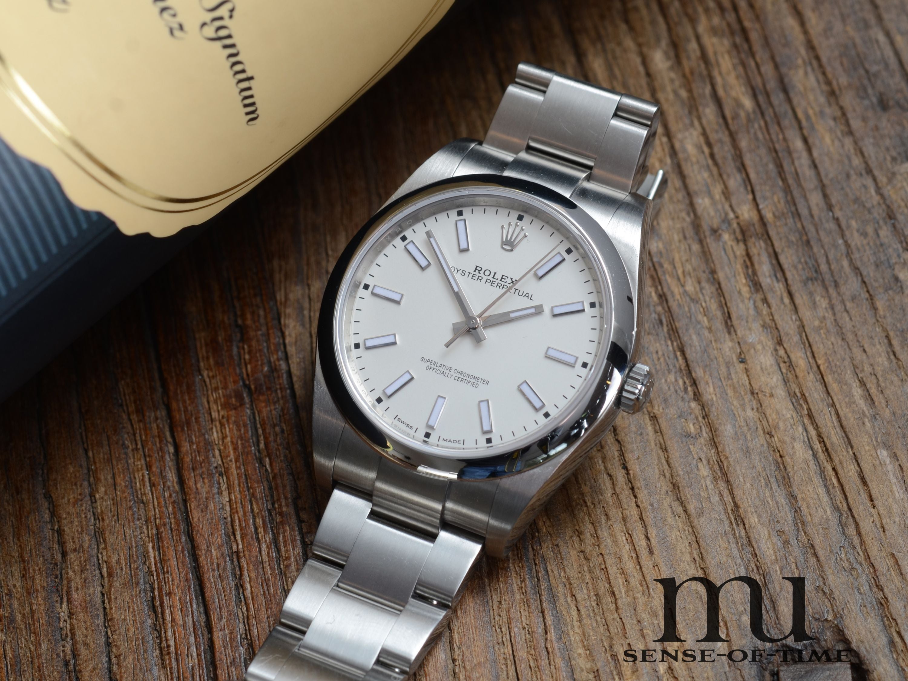 Rolex Oyster Perpetual 39mm, Weißes Zifferblatt, Ref. 114300